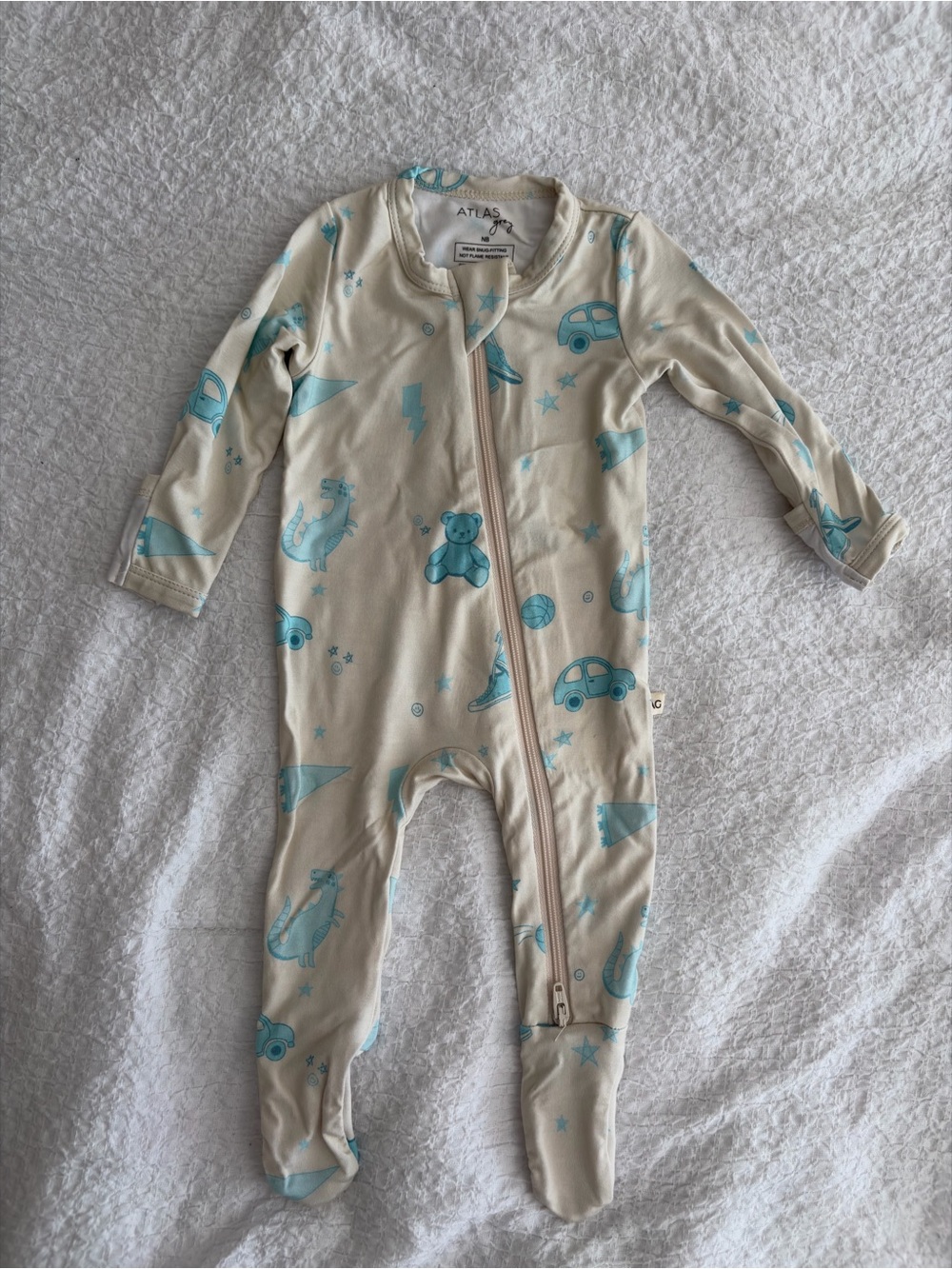 Cream Footed One-Piece with Light Blue Toy & Vehicle Motif